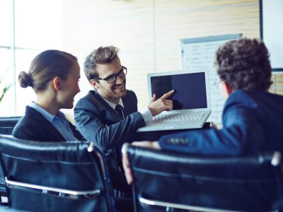 Young businessman making presentation of his ideas upon project